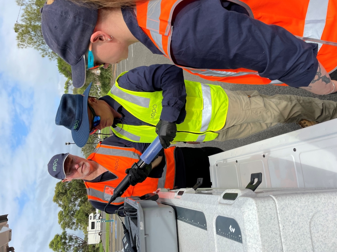 EPA staff preparing sampling equipment for the assessment of stormwater entering Lake Illawarra, Credit: Julie Klein, EPA