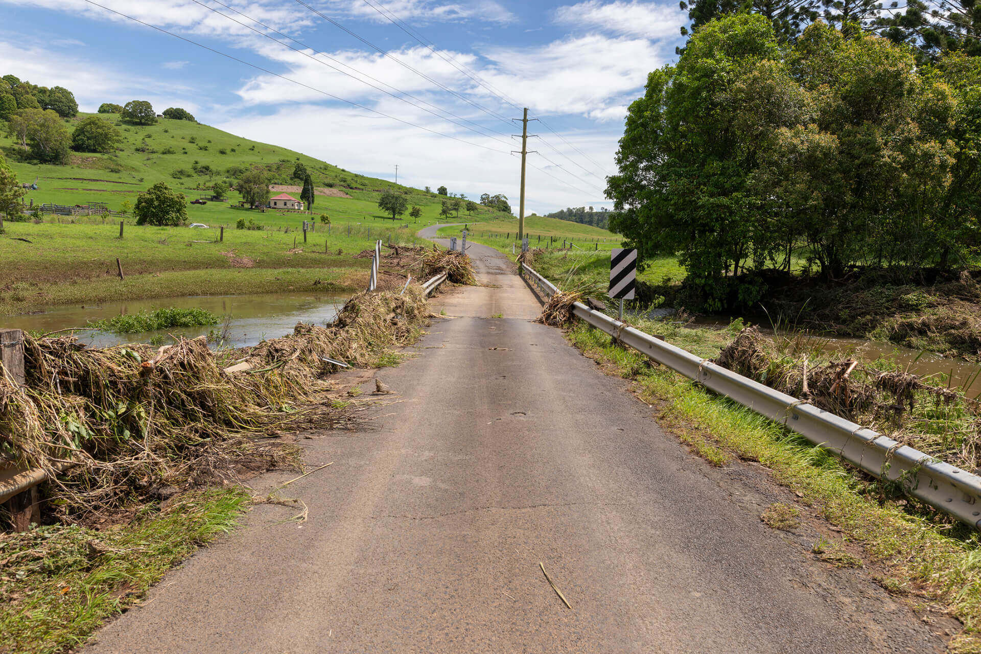 Flood debris on rural bridge