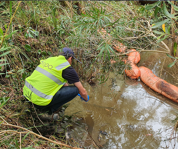 EPA officer onsite taking water samples in Kurnell