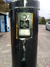 Camouflaged camera in a bollard